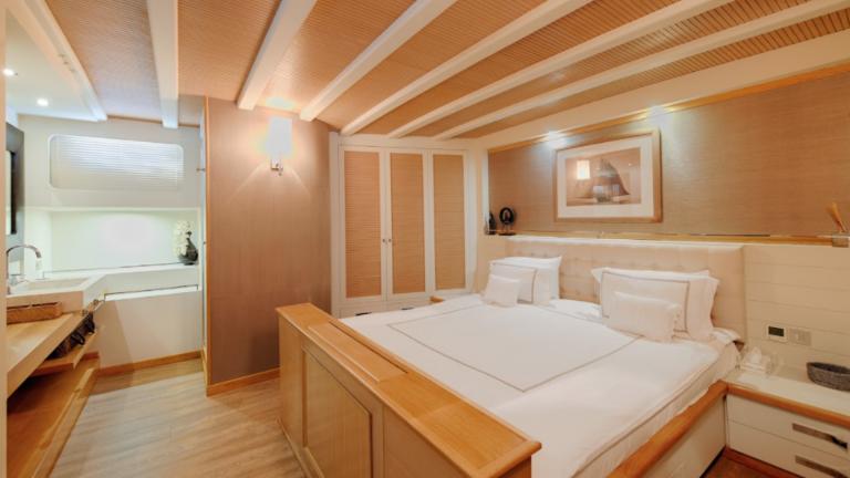 Full view of chic bedroom in modern design in beige tones